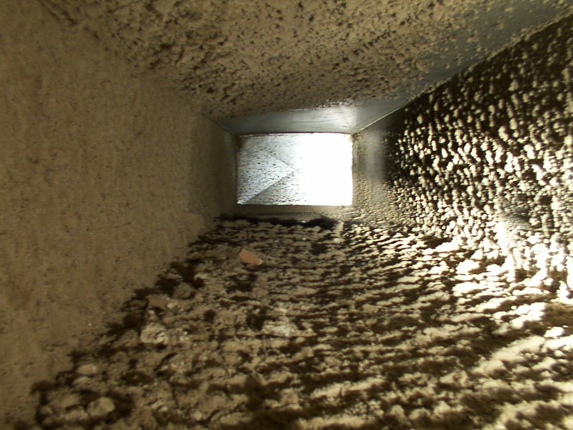 Interview view of very dirty air duct in a home.